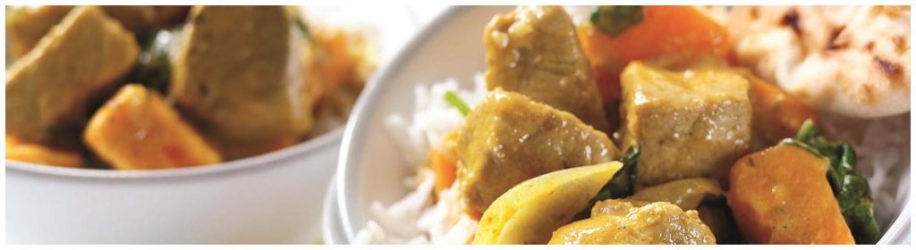 Curry de porc à la noix de coco avec coriandre fraîche
